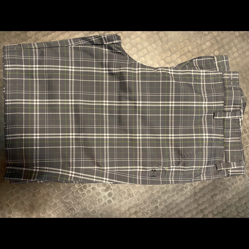 Three pairs of under armor and a Callaway golf shorts